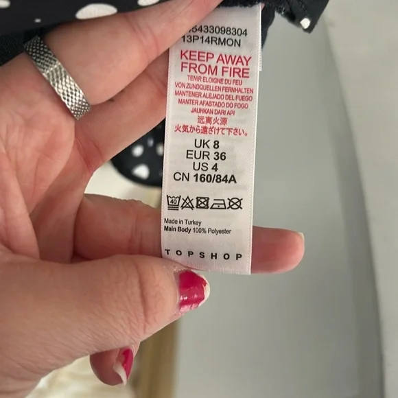 Chic Black and White Polka Dot Ruffle Top - Picture 10 of 10